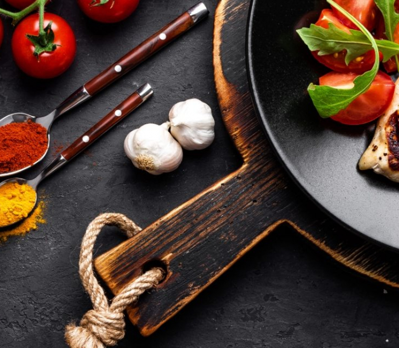 grilled-chicken-fillet-on-black-background-top-PDZWS7M